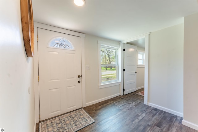 968 Barlow St, Traverse City, MI 49686 - foyer featuring dark wood-style flooring and baseboards