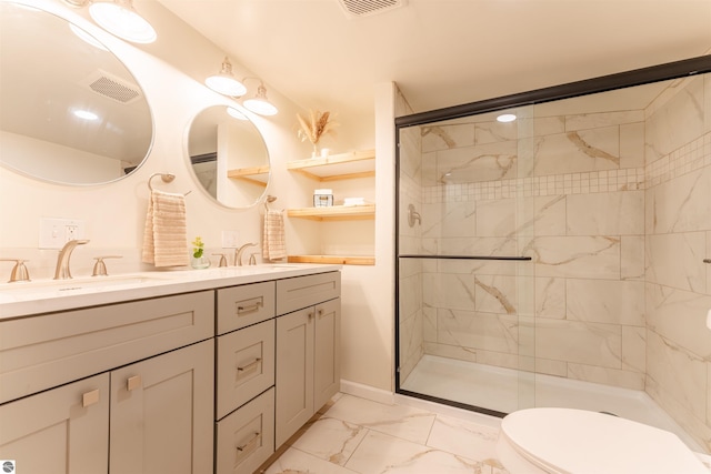 968 Barlow St, Traverse City, MI 49686 - full bath featuring marble finish flooring, a stall shower, double vanity, toilet, and baseboards