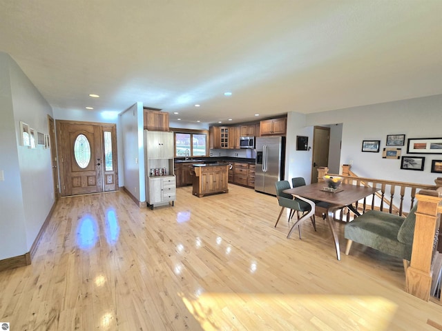 205 S Elm St, Suttons Bay, MI 49682 - entrance foyer with light wood-type flooring, recessed lighting, and baseboards