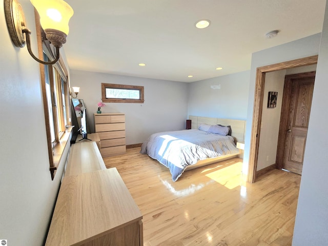 205 S Elm St, Suttons Bay, MI 49682 - bedroom with baseboards, light wood-style flooring, and recessed lighting