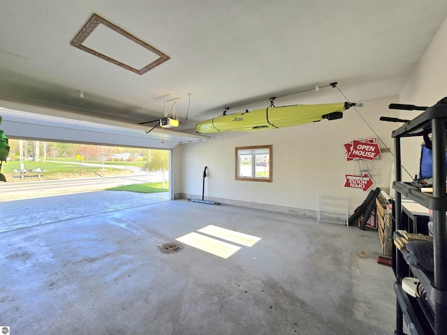 205 S Elm St, Suttons Bay, MI 49682 - garage featuring a garage door opener