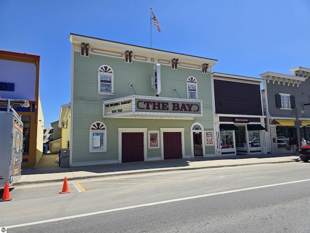 205 S Elm St, Suttons Bay, MI 49682 - view of building exterior featuring a garage