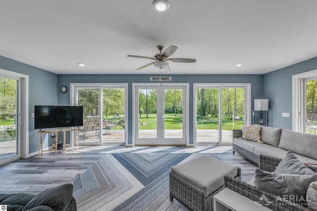 1703 Rau Rd, West Branch, MI 48661 - living room featuring recessed lighting, a ceiling fan, wood finished floors, and baseboards