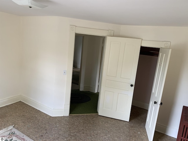 unfurnished bedroom featuring baseboards