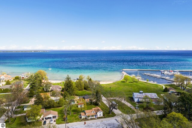 302 N Rose St, Northport, MI 49670 - aerial overview of property's location with a nearby body of water