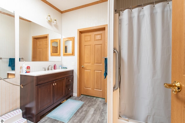 2250 N Coleman Rd, Coleman, MI 48618 - bathroom featuring ornamental molding, wood finished floors, curtained shower, vanity, and decorative backsplash