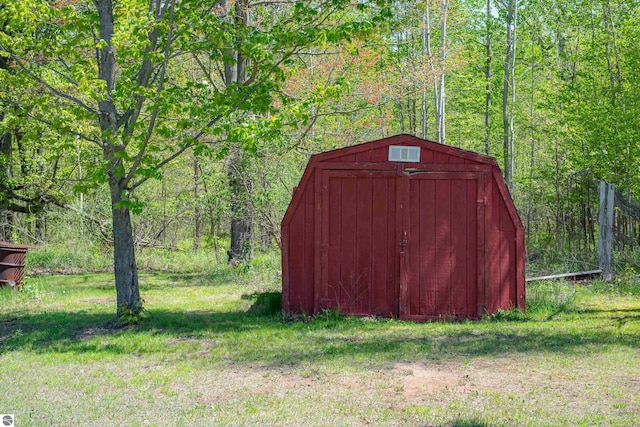 2250 N Coleman Rd, Coleman, MI 48618 - view of shed featuring a forest view