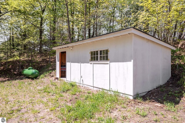 11199 Center Rd, Traverse City, MI 49686 - view of shed featuring a wooded view