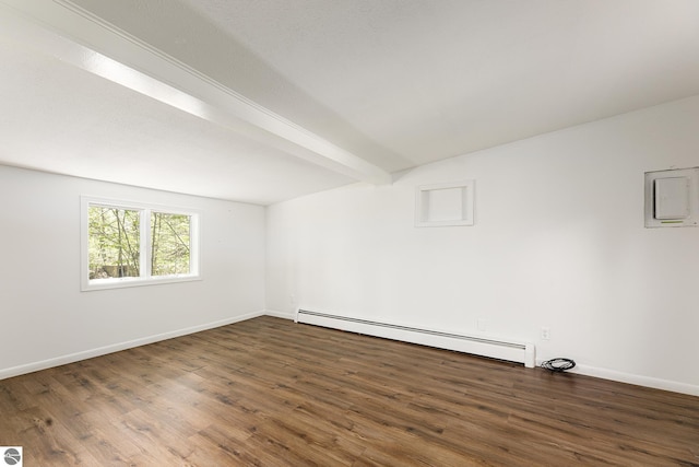 11199 Center Rd, Traverse City, MI 49686 - spare room with baseboard heating, wood finished floors, baseboards, and beam ceiling