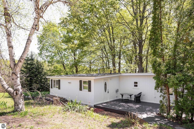 11199 Center Rd, Traverse City, MI 49686 - view of front of house featuring a deck