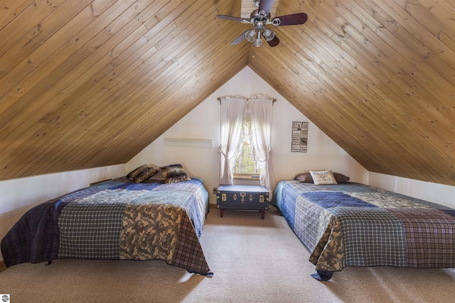 carpeted bedroom featuring ceiling fan, vaulted ceiling, and wooden ceiling