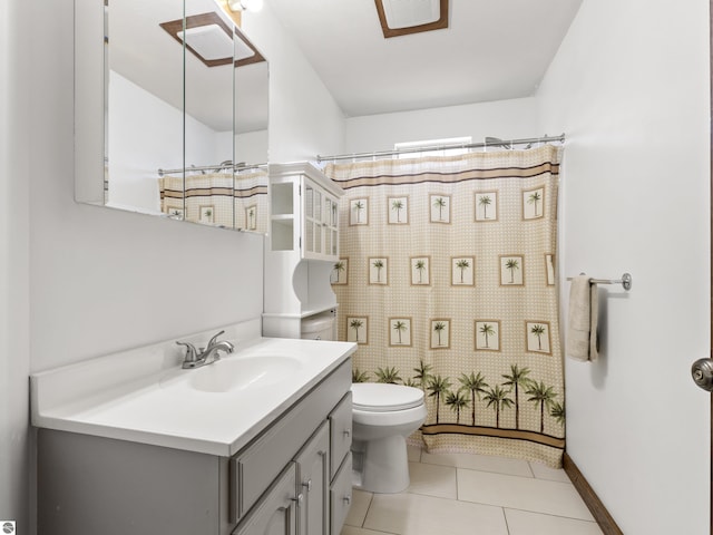 4267 Main St, Kingsley, MI 49649 - bathroom featuring toilet, vanity, curtained shower, and tile patterned flooring