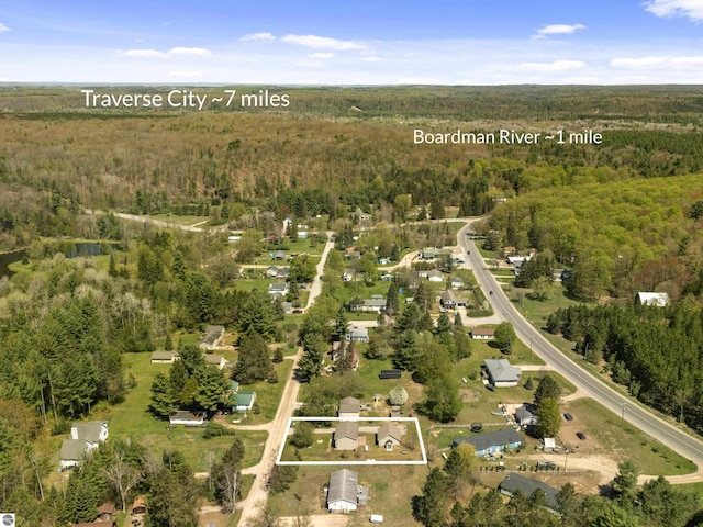 4267 Main St, Kingsley, MI 49649 - view of property location featuring a heavily wooded area