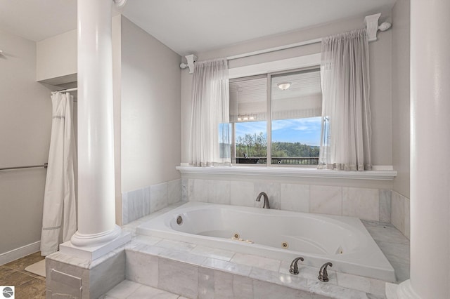 3290 Sumac Trl, Frankfort, MI 49635 - bathroom with a whirlpool tub and baseboards