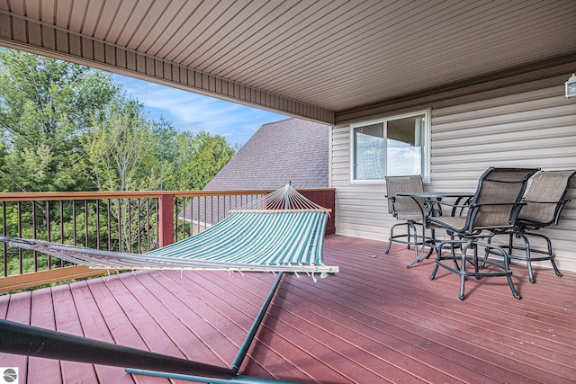 3290 Sumac Trl, Frankfort, MI 49635 - wooden terrace featuring outdoor dining space