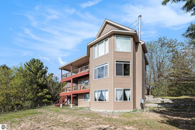 3290 Sumac Trl, Frankfort, MI 49635 - back of property featuring a balcony and stairs