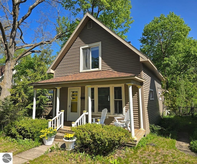 314 W Ninth St, Traverse City, MI 49684 - view of front of house featuring covered porch
