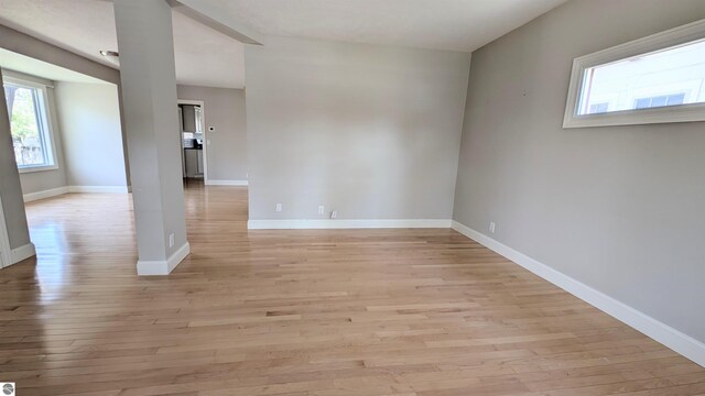 314 W Ninth St, Traverse City, MI 49684 - empty room featuring light wood-style flooring and baseboards