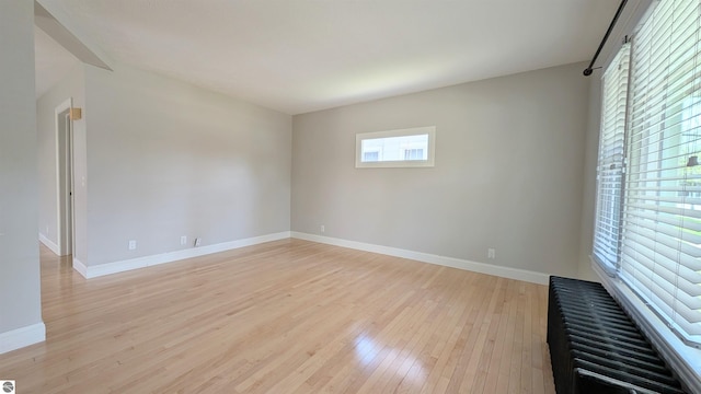 314 W Ninth St, Traverse City, MI 49684 - unfurnished room featuring light wood-style floors and baseboards