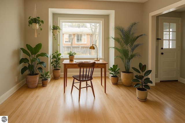 314 W Ninth St, Traverse City, MI 49684 - sitting room with baseboards and wood finished floors