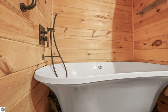 1493 NE Laura Ln, Kalkaska, MI 49646 - full bath featuring a freestanding tub