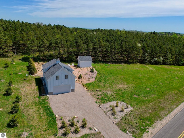 2494 N Setterbo Rd, Suttons Bay, MI 49682 - view from above of property with a heavily wooded area