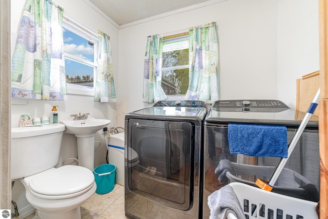 5817 Gross Dr, Weidman, MI 48893 - washroom with washer and dryer, crown molding, and plenty of natural light