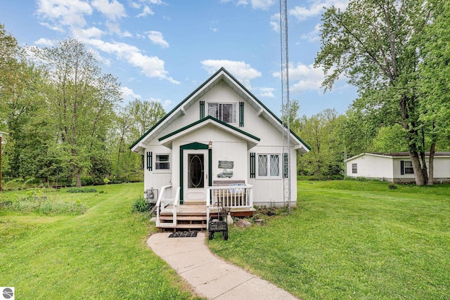 5817 Gross Dr, Weidman, MI 48893 - view of front of property featuring a front yard