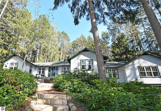 9017 S Dunns Farm Rd, Maple City, MI 49664 - view of split level home