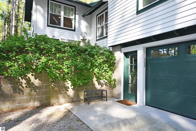 9017 S Dunns Farm Rd, Maple City, MI 49664 - doorway to property featuring a patio