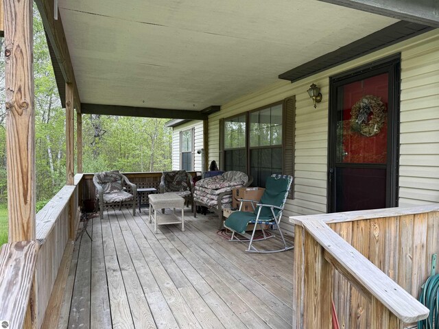 6661 Terry Ln, Hale, MI 48739 - wooden deck with outdoor lounge area