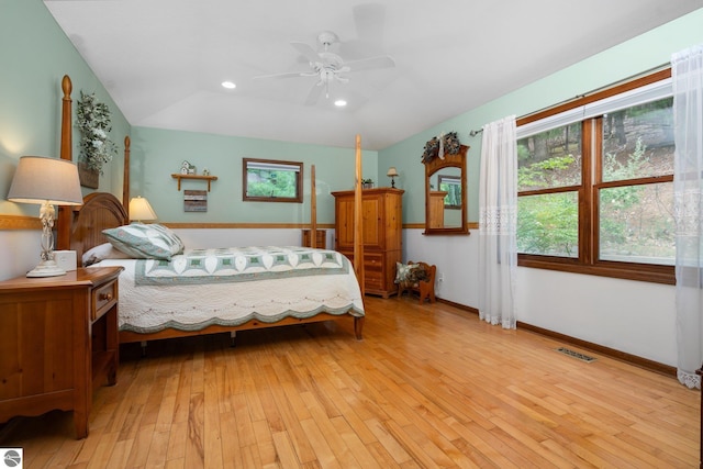 4611 Audubon Dr, Traverse City, MI 49686 - bedroom featuring light wood finished floors, vaulted ceiling, recessed lighting, baseboards, and ceiling fan