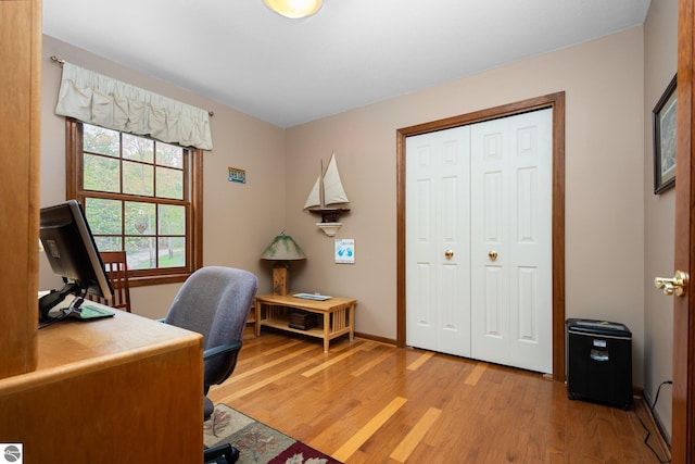 4611 Audubon Dr, Traverse City, MI 49686 - office area featuring light wood-type flooring and baseboards