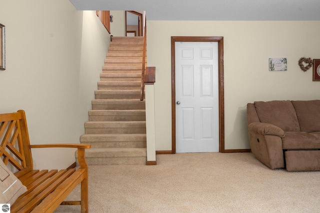 4611 Audubon Dr, Traverse City, MI 49686 - stairs featuring carpet flooring and baseboards