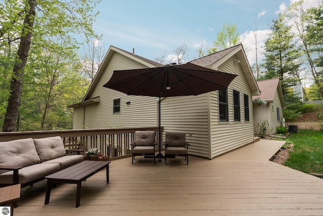 4611 Audubon Dr, Traverse City, MI 49686 - deck with outdoor lounge area and cooling unit