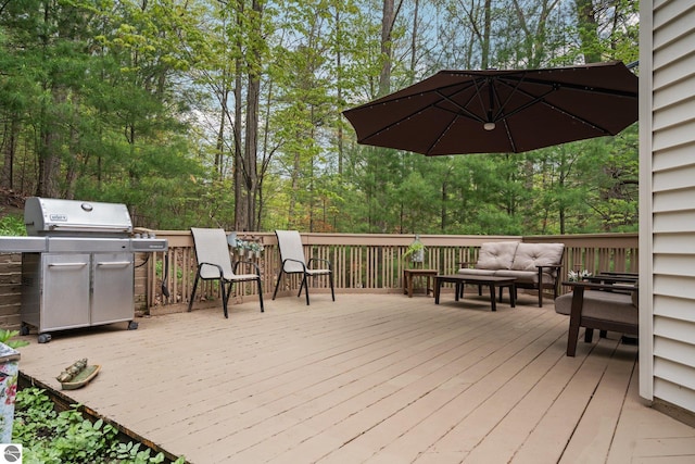 4611 Audubon Dr, Traverse City, MI 49686 - wooden deck with an outdoor hangout area and a grill