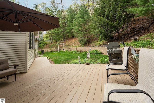 4611 Audubon Dr, Traverse City, MI 49686 - wooden deck featuring a grill