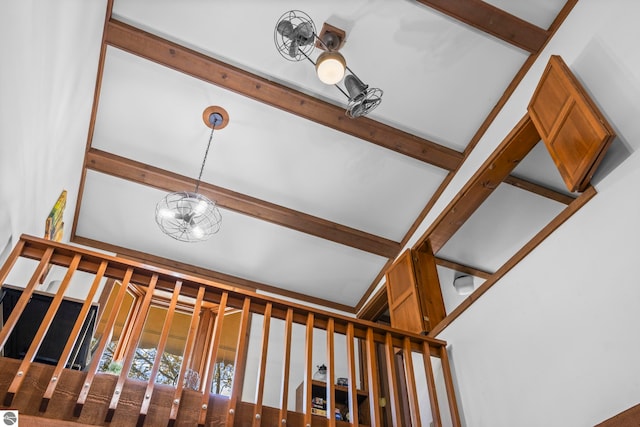 6519 Schuss Mountain Ln Unit 3511-3512, Mancelona, MI 49659 - detailed view of a chandelier and beamed ceiling