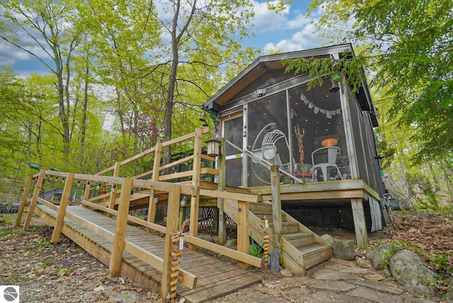10092 S Elm St, Traverse City, MI 49684 - deck with a sunroom