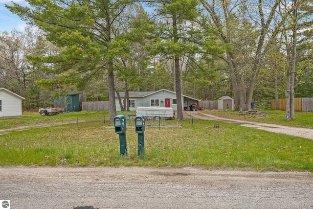 1615 Pine Dr, Traverse City, MI 49686 - view of front facade featuring dirt driveway