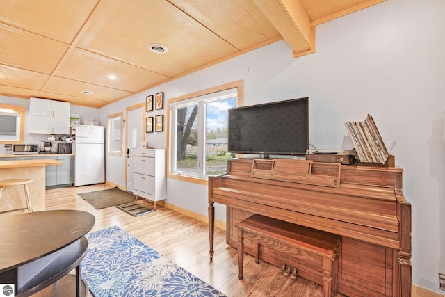 1615 Pine Dr, Traverse City, MI 49686 - living area featuring light wood-style flooring, recessed lighting, baseboards, and beam ceiling
