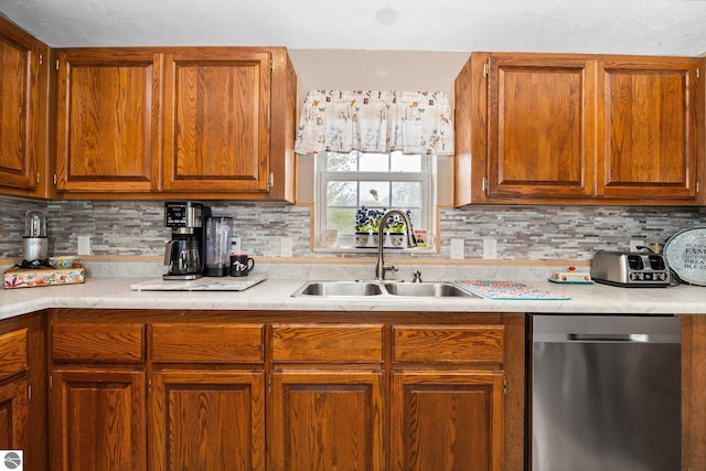 5206 S Riverview Dr, Lake City, MI 49651 - kitchen featuring stainless steel dishwasher, a sink, and light countertops