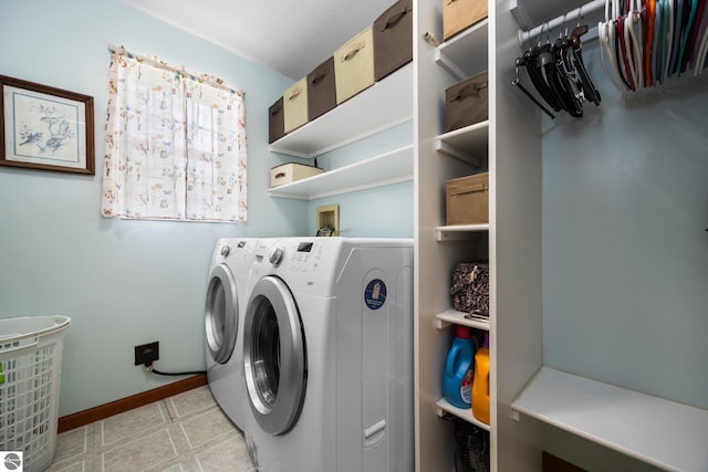 5206 S Riverview Dr, Lake City, MI 49651 - washroom with separate washer and dryer and baseboards