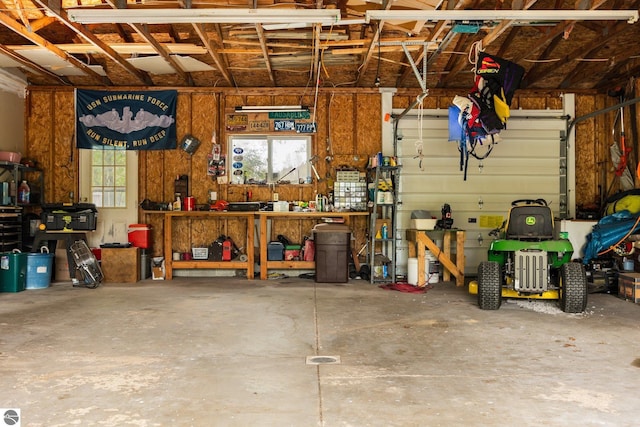 5206 S Riverview Dr, Lake City, MI 49651 - garage with a workshop area