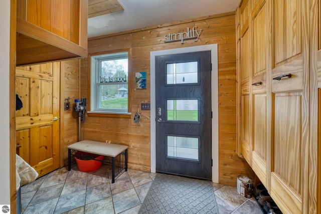 6433 S W Bayshore Dr, Traverse City, MI 49684 - entryway featuring wooden walls