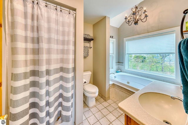 6433 S W Bayshore Dr, Traverse City, MI 49684 - bathroom with tile patterned floors, toilet, vaulted ceiling, a bathtub, and a chandelier