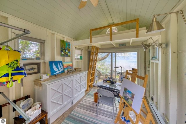 6433 S W Bayshore Dr, Traverse City, MI 49684 - sunroom featuring a baseboard radiator