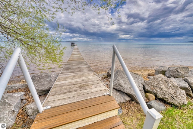 6433 S W Bayshore Dr, Traverse City, MI 49684 - dock featuring a water view