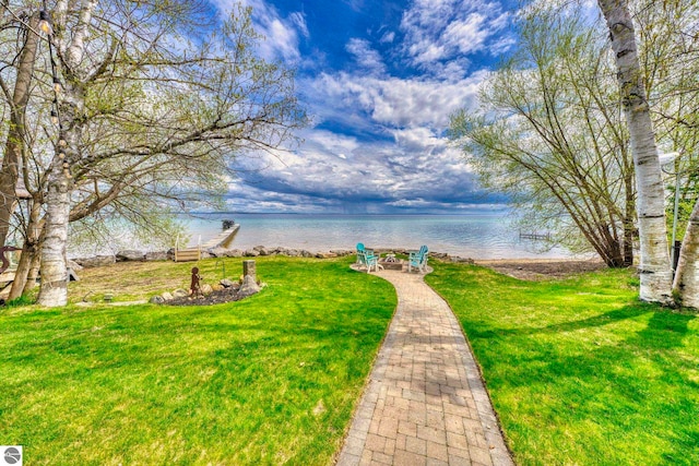 6433 S W Bayshore Dr, Traverse City, MI 49684 - view of grassy yard with a water view