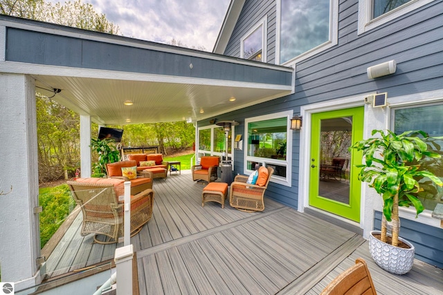 6433 S W Bayshore Dr, Traverse City, MI 49684 - wooden deck featuring an outdoor living space